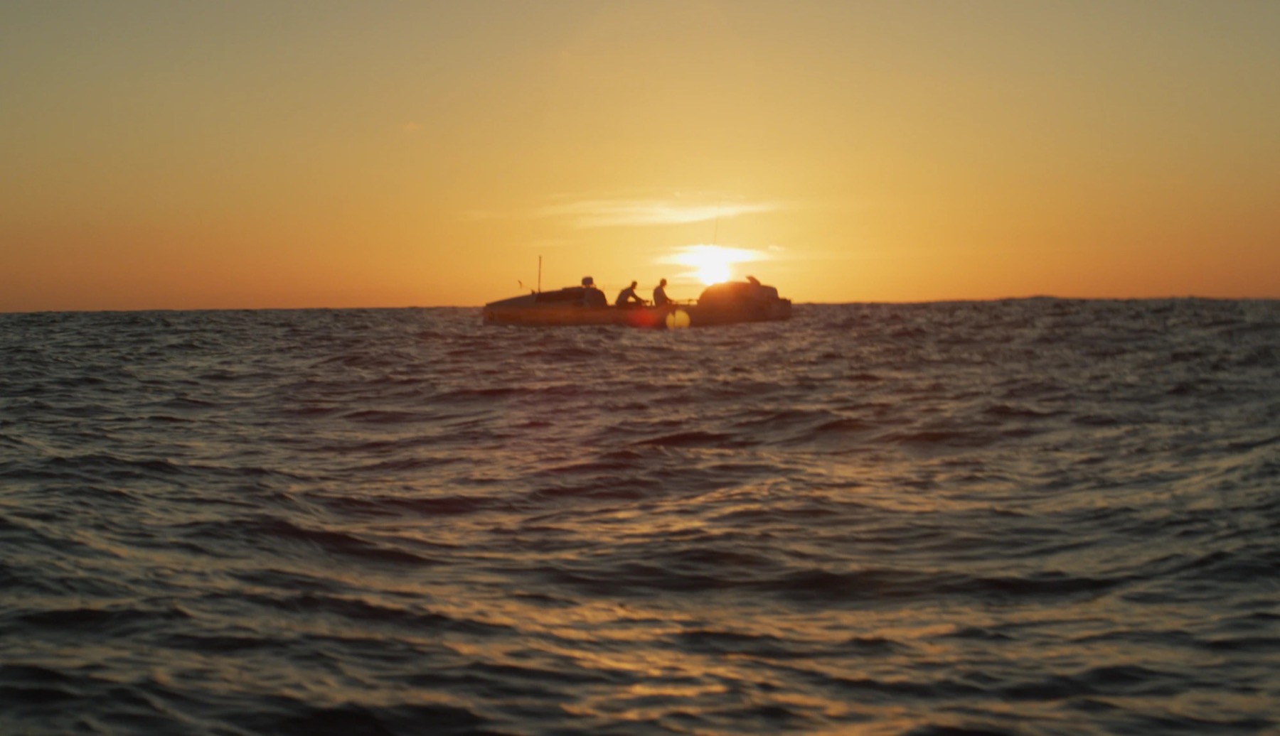 Rowing boat at sunset on the Atlantic